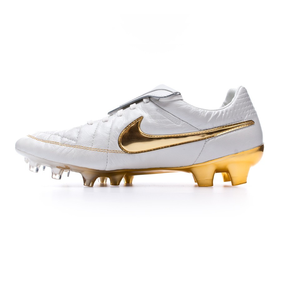 white and gold nike tiempo