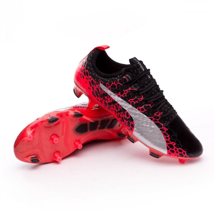 black and red puma football boots