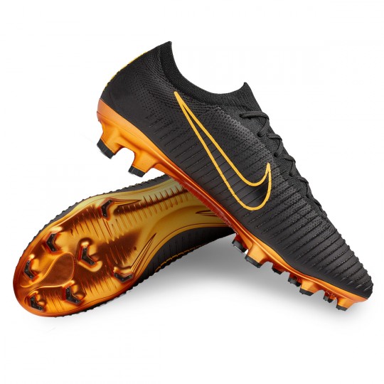 botines nike negros con dorado