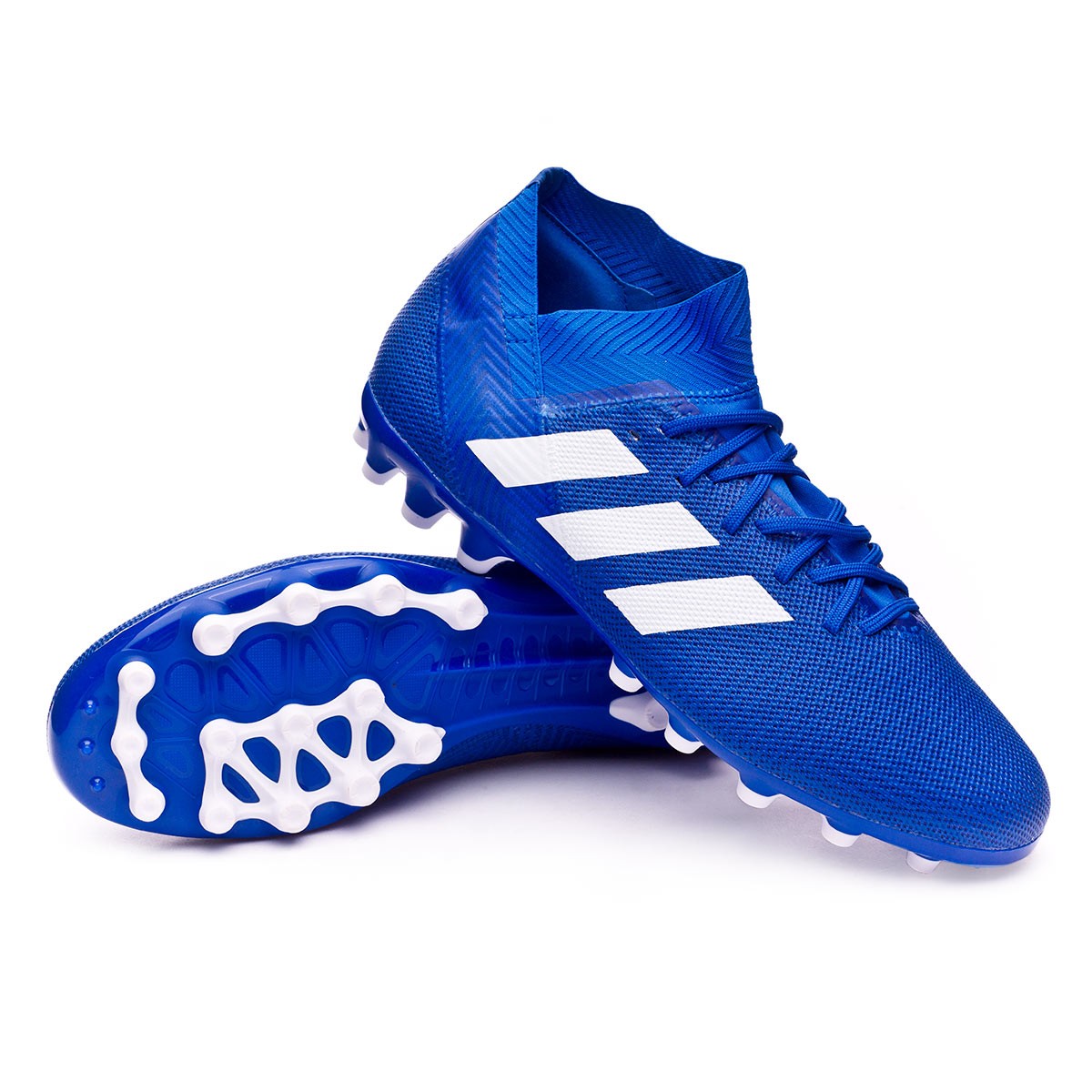 white and blue adidas football boots