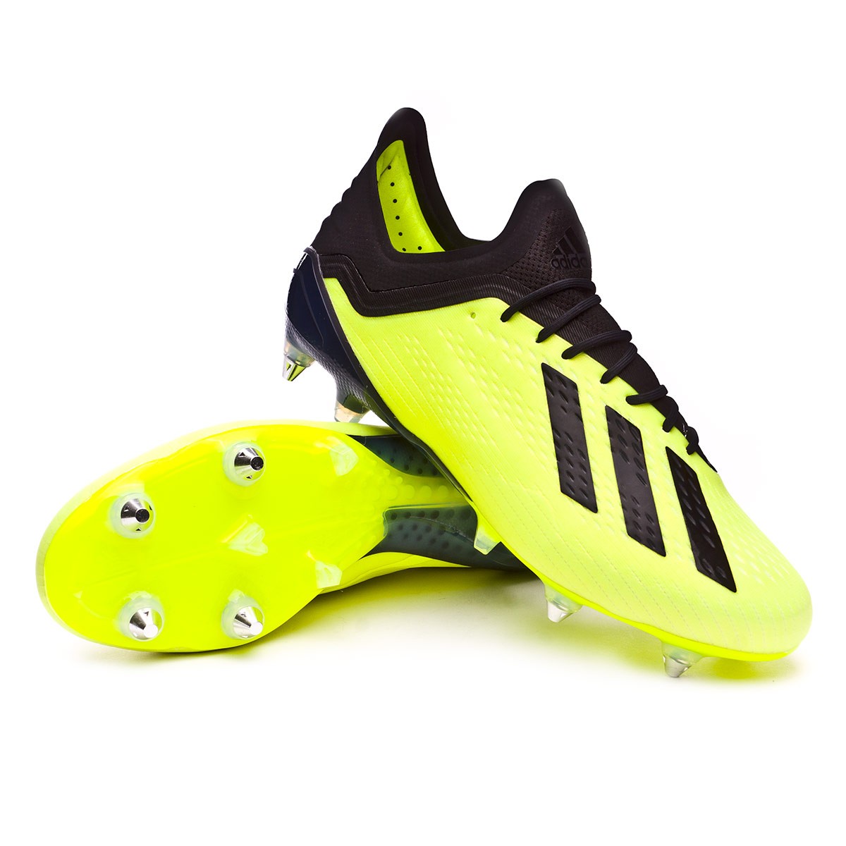 yellow and black football boots