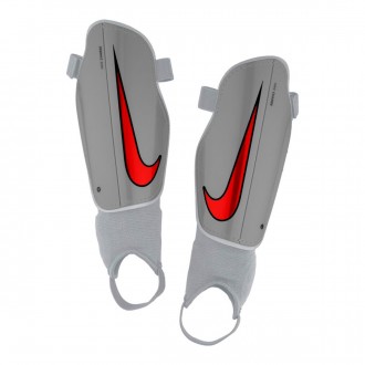 Caneleira  Nike Charge Crianças Pure platinum-Wolf grey-Bright crimson