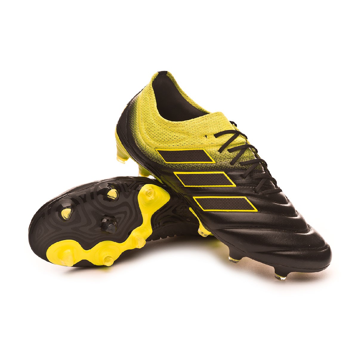 yellow and black adidas football boots