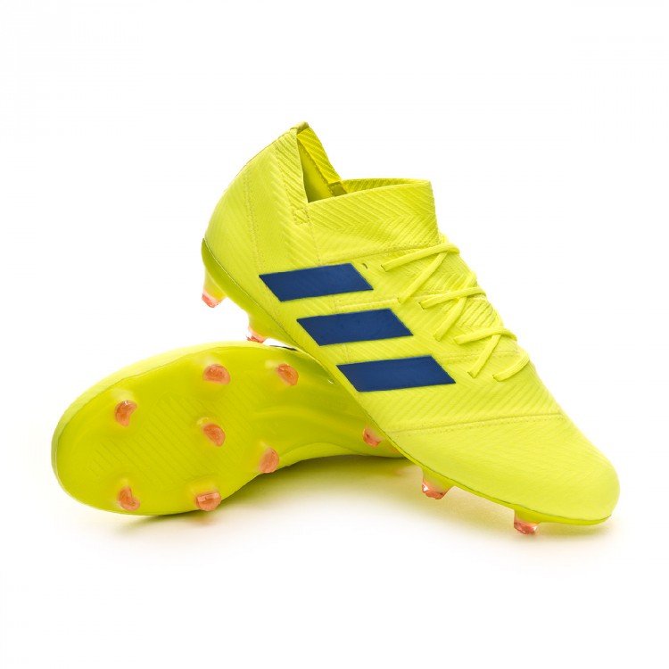 blue and yellow adidas football boots