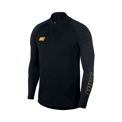 black and metallic gold nike shirt