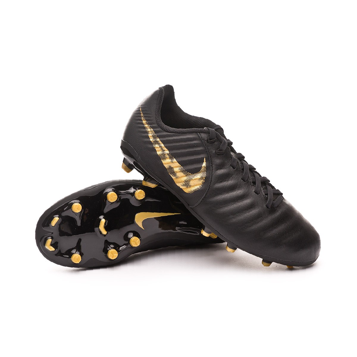 nike football boots black and gold