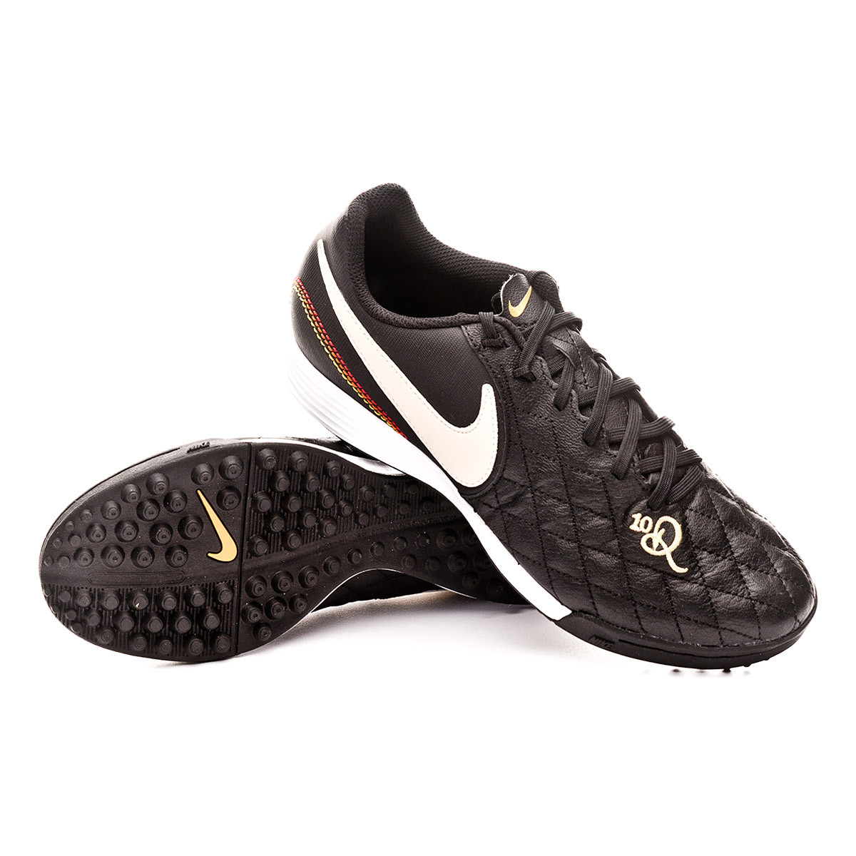 black and gold nike turfs