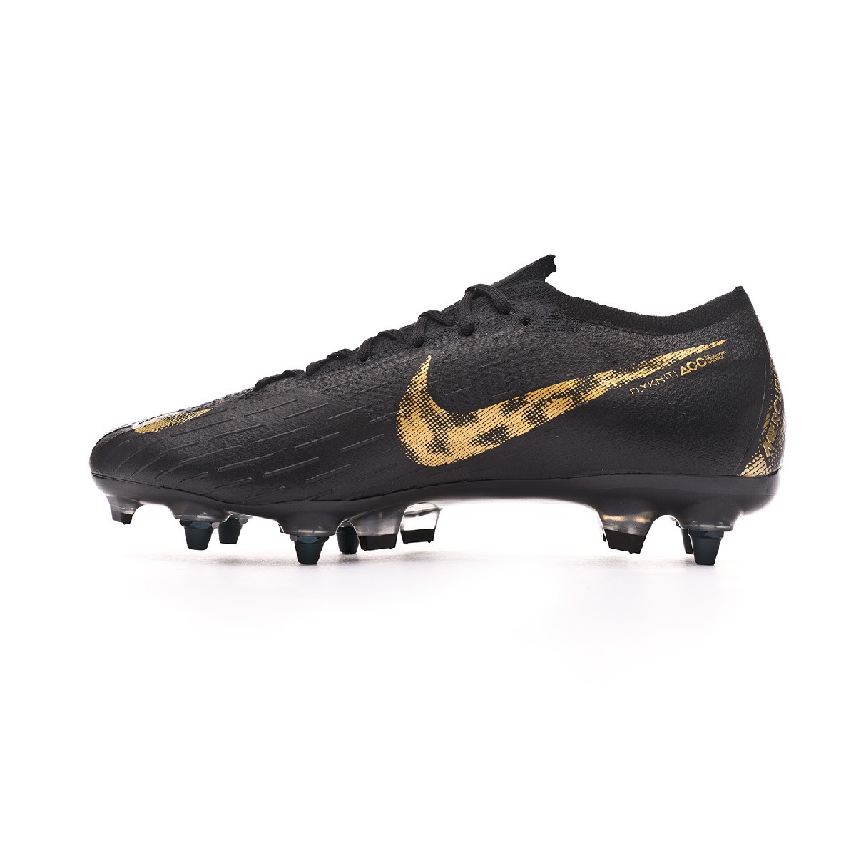 nike football boots black and gold