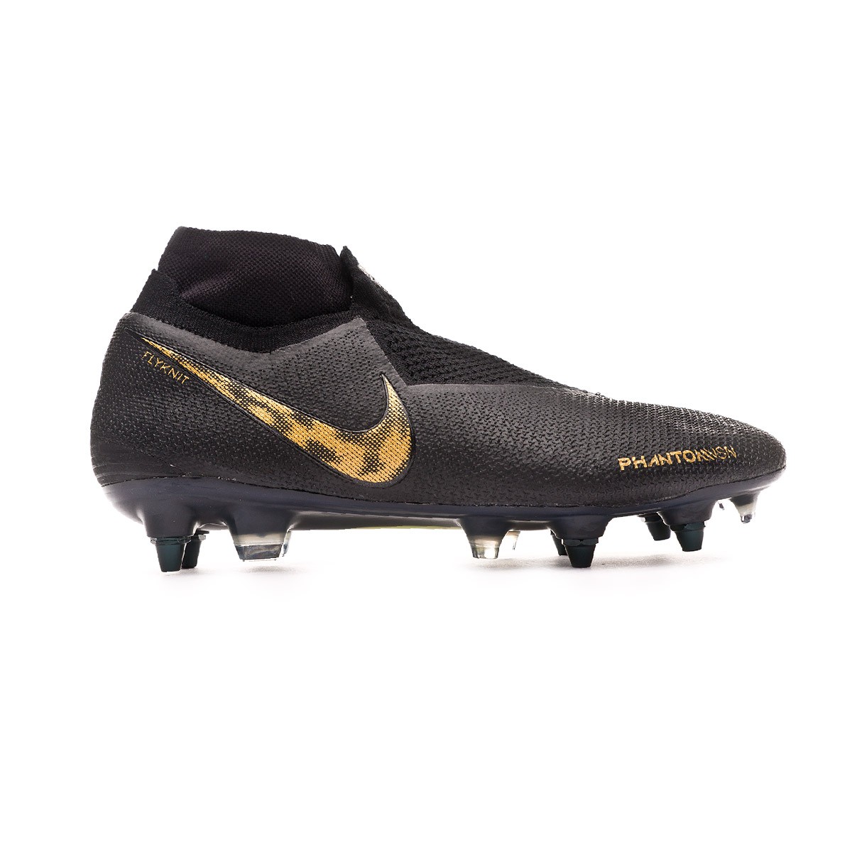 gold and black nike boots