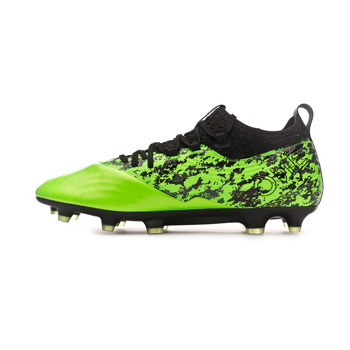 puma green and black football boots