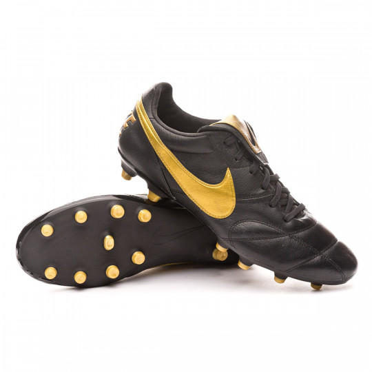 nike football boots black gold