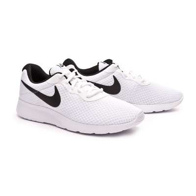 white and black nike tanjun