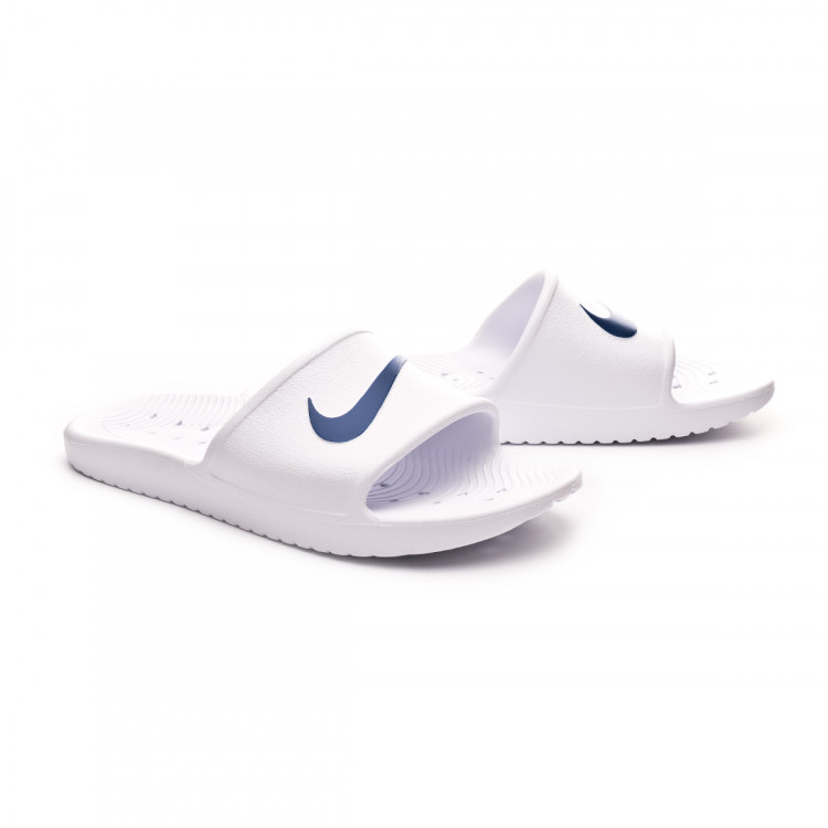 blue and white nike flip flops