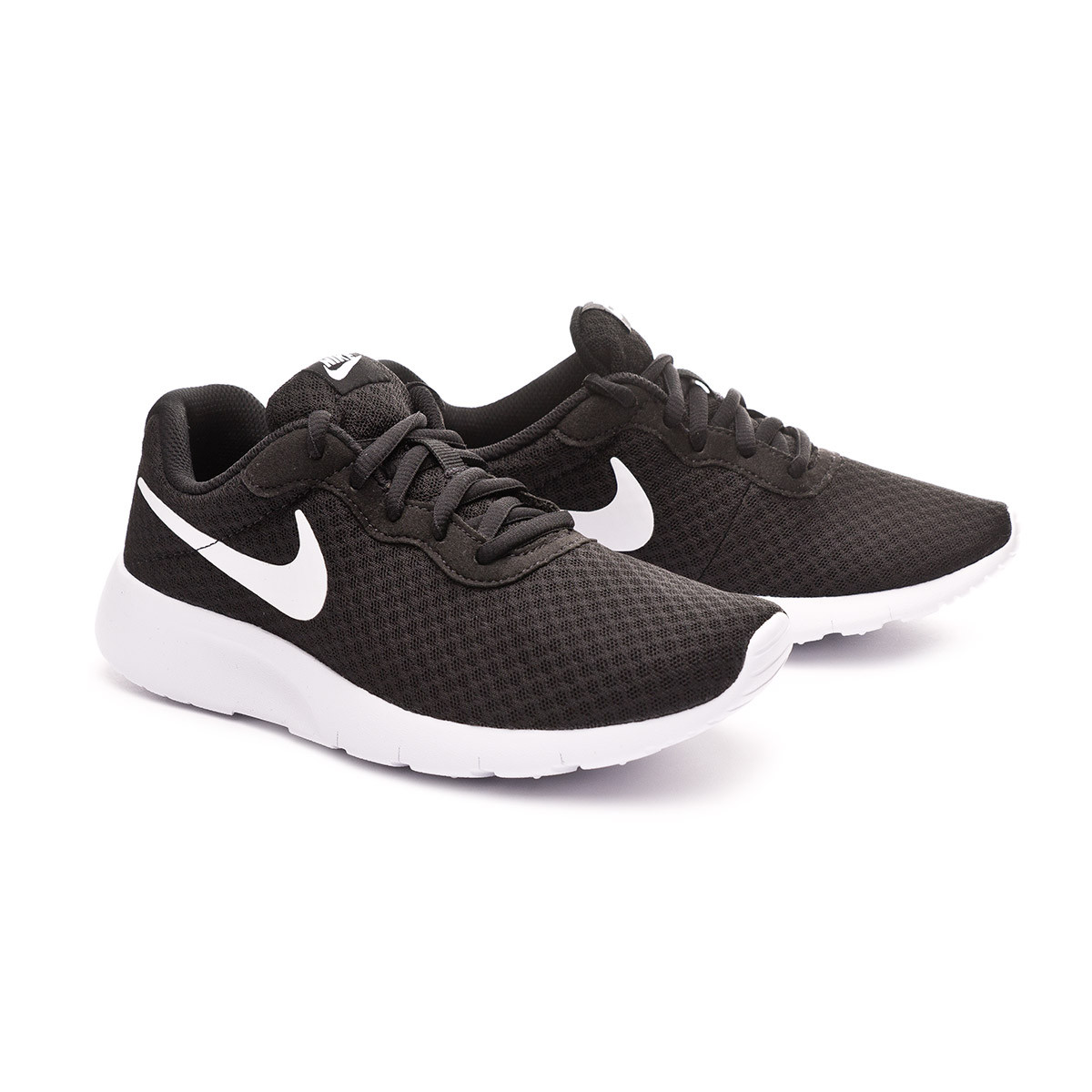 nike tanjun black and white kids