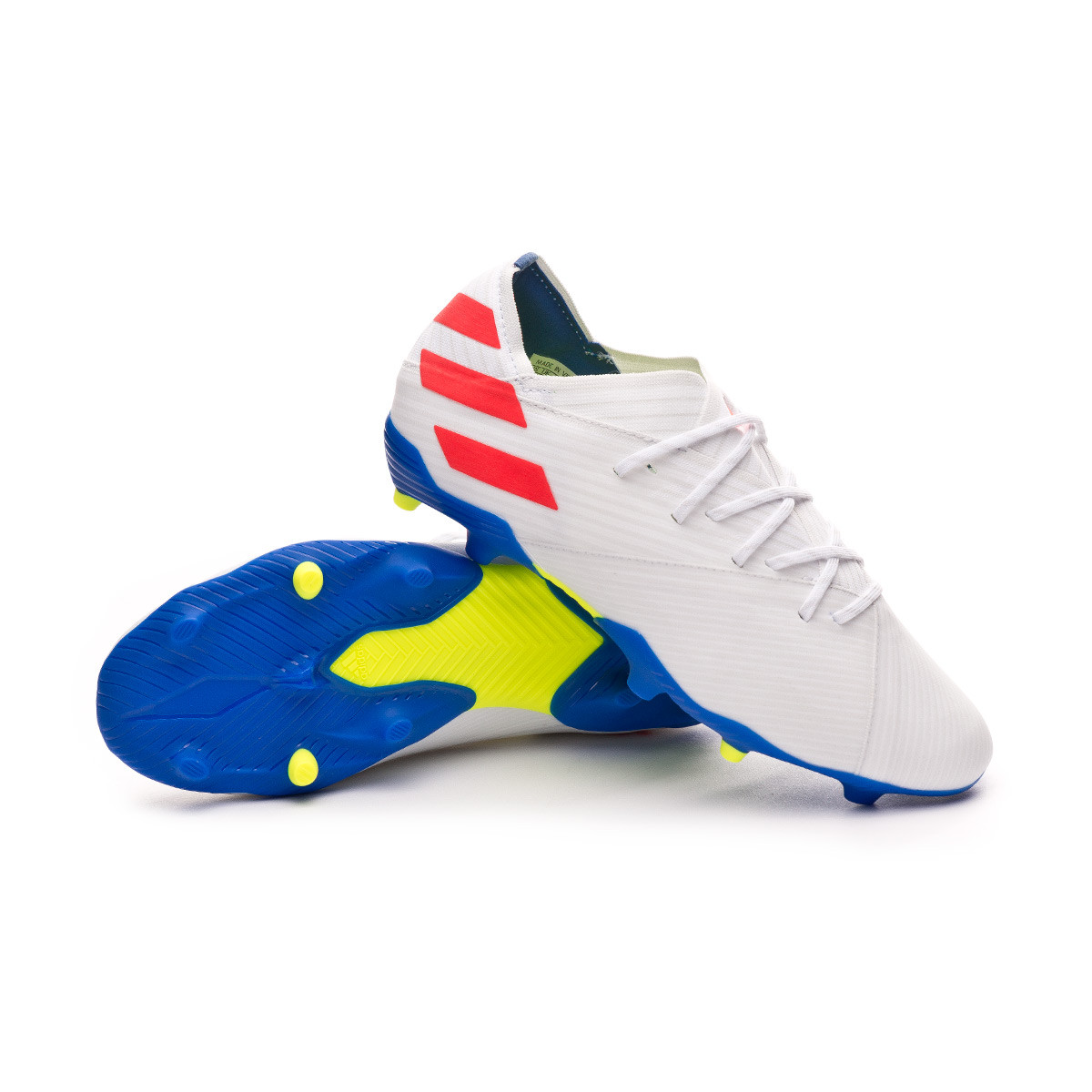 white and red football boots