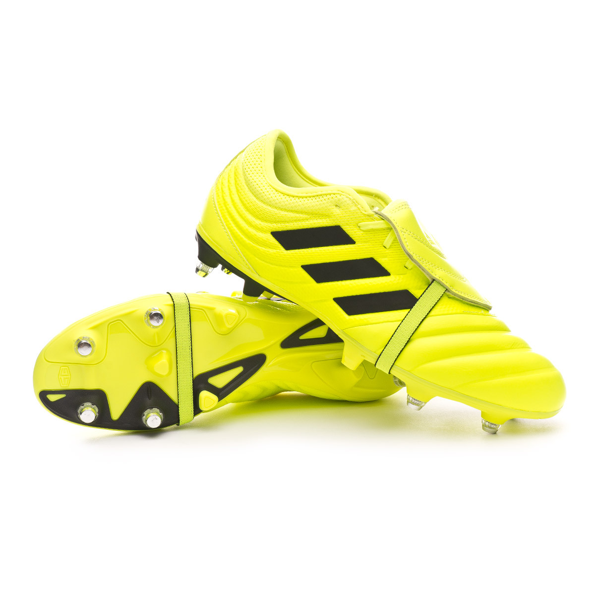 black and yellow adidas football boots
