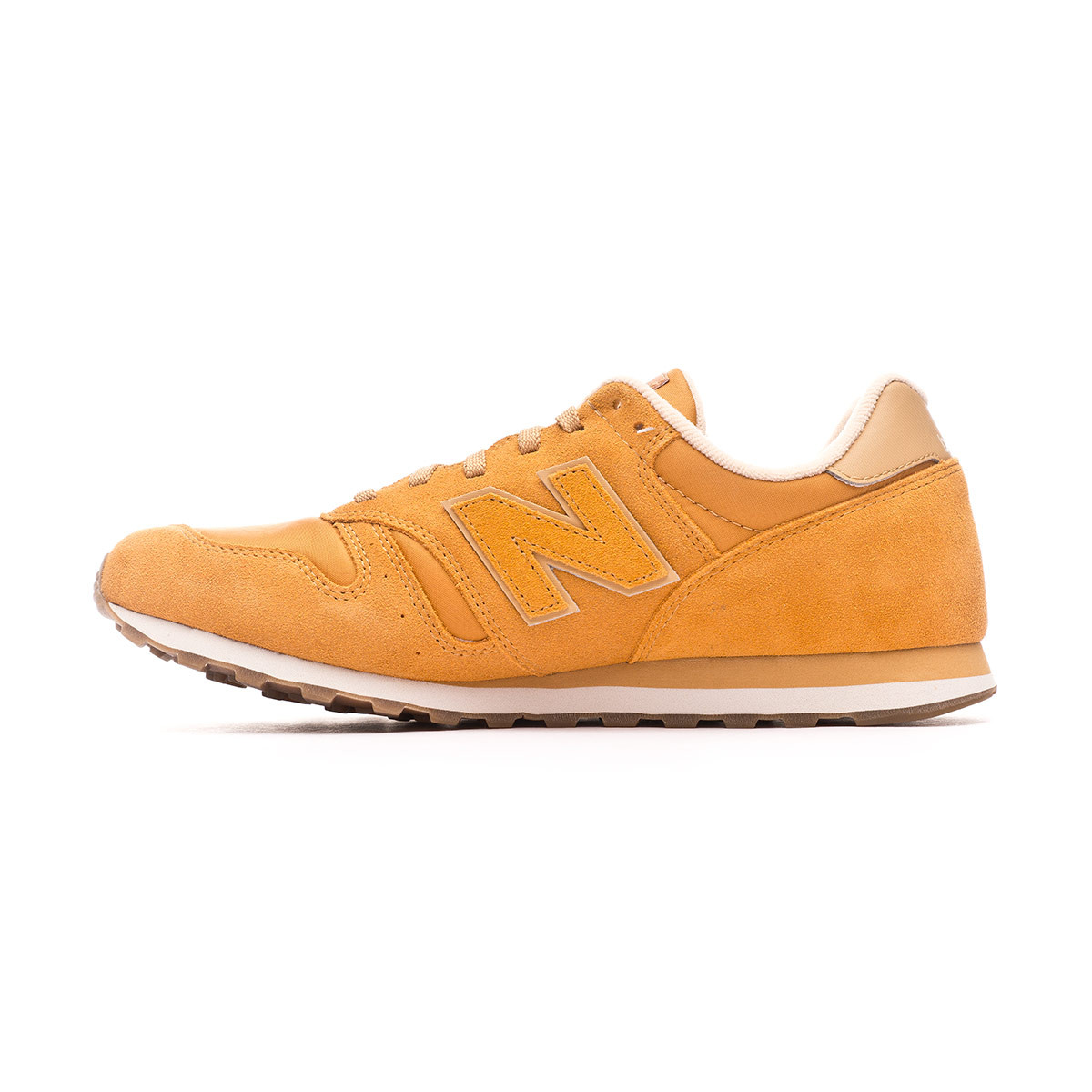 new balance yellow 373 metallic trainers