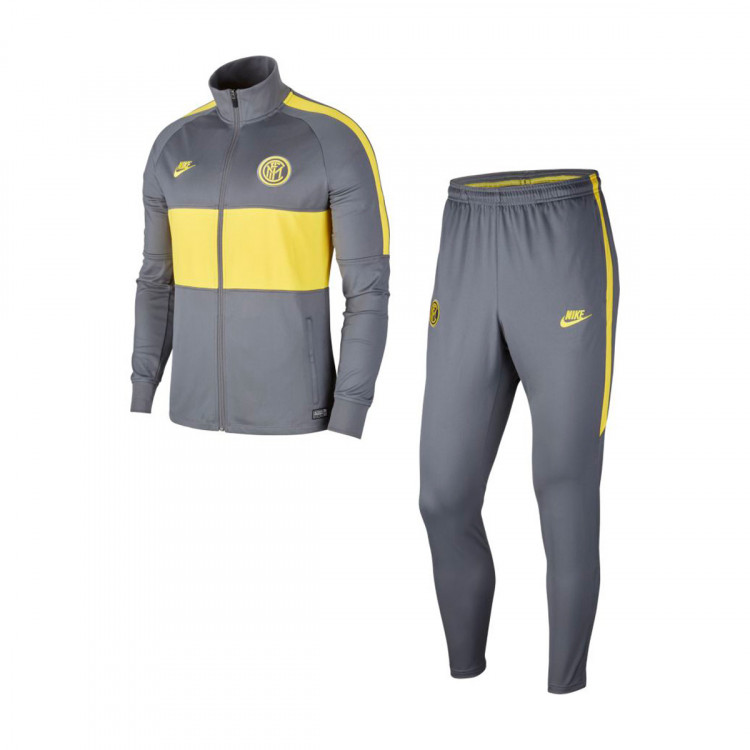 grey and yellow nike tracksuit