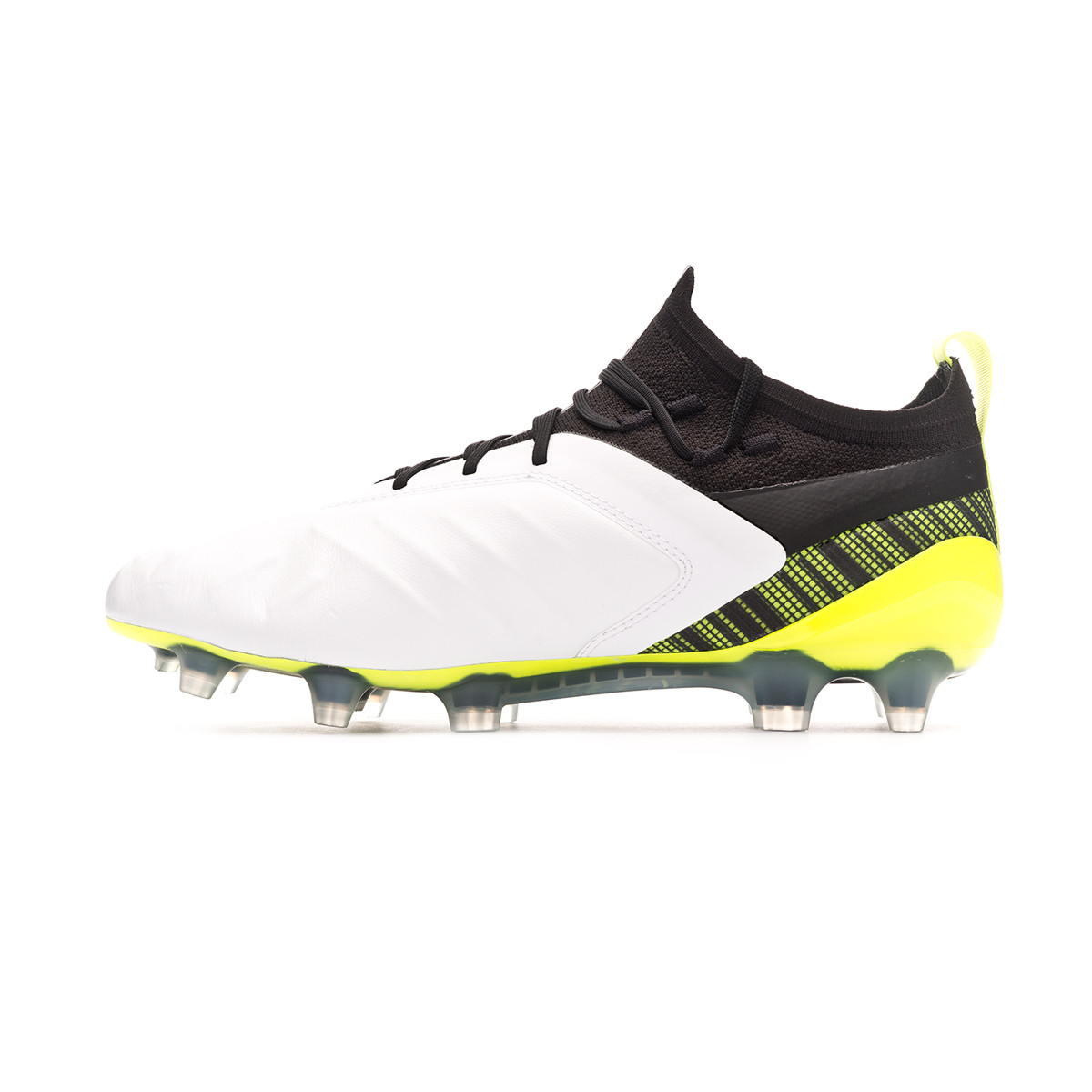 black and yellow puma football boots