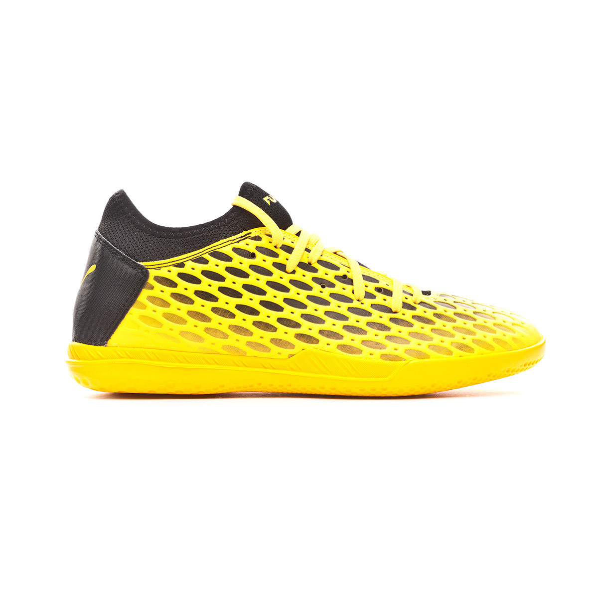 puma yellow and black shoes