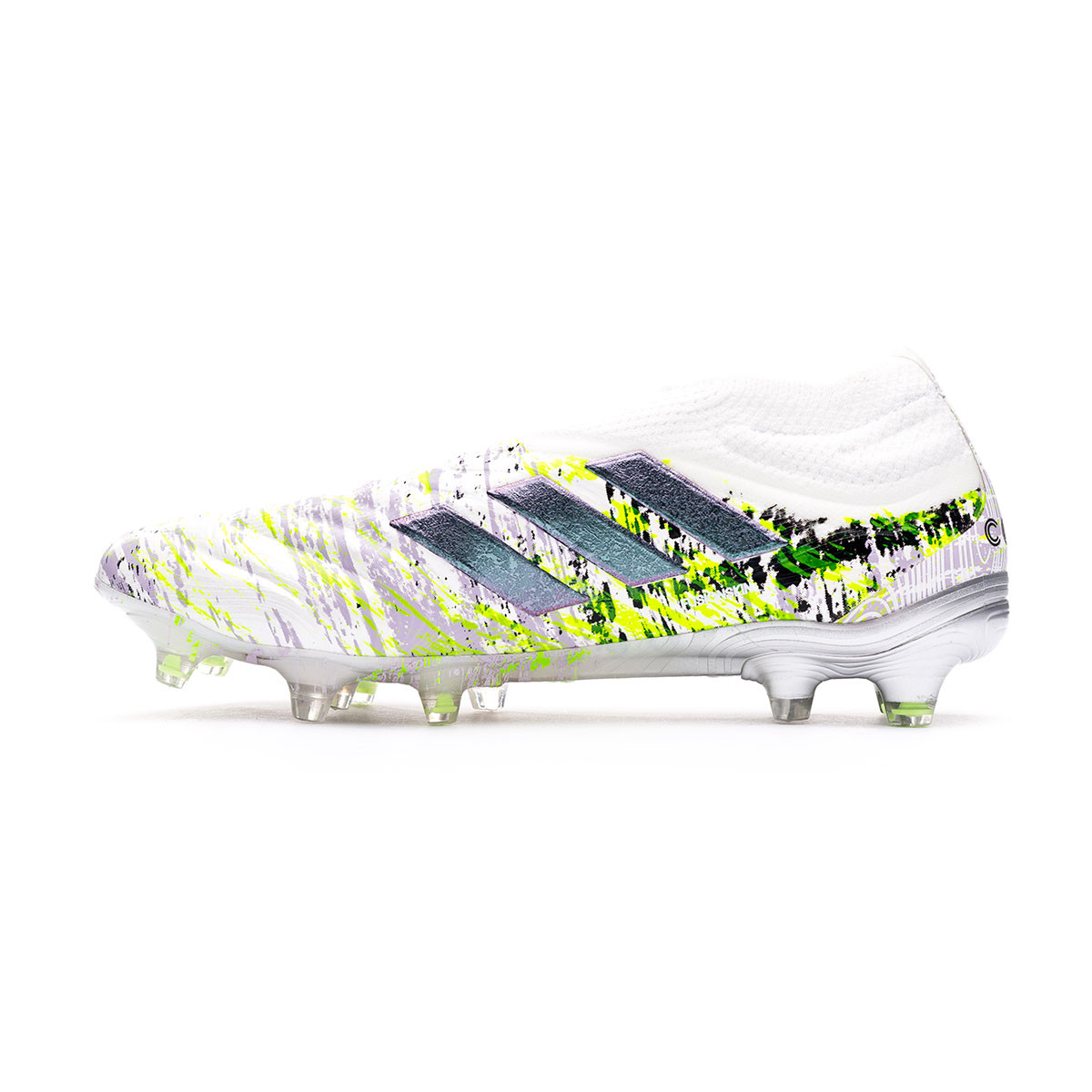 white and green adidas football boots