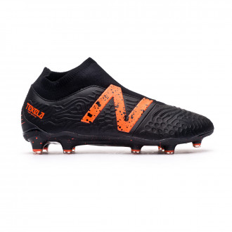 orange new balance football boots