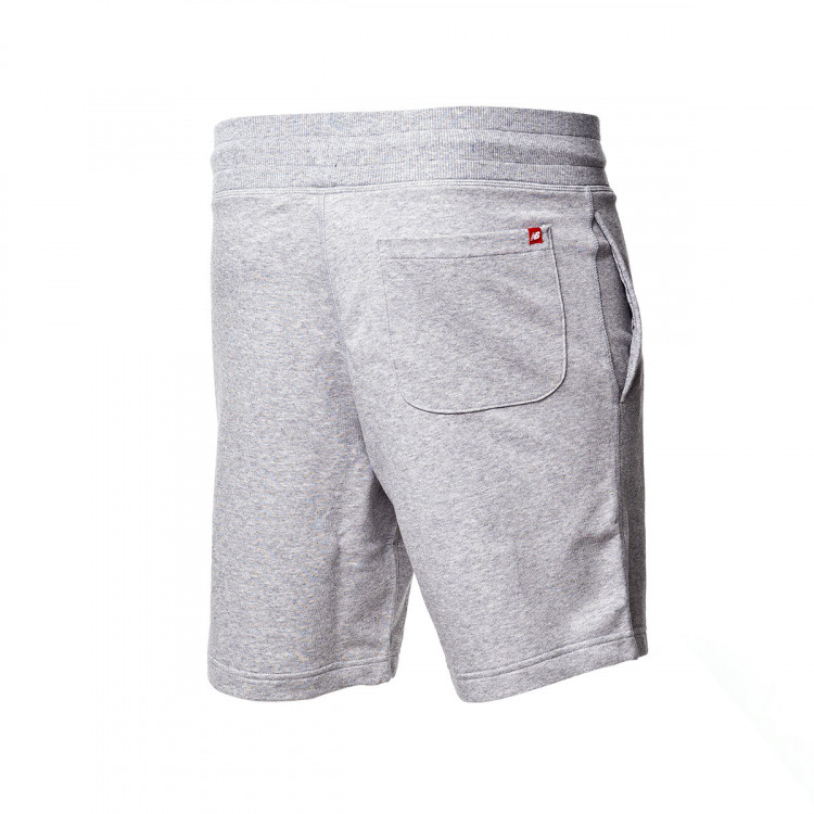 pantalon-corto-new-balance-essentials-stacked-logo-gris-1.jpg