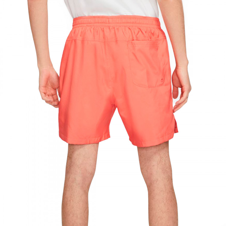 Shorts Nike NSW Woven Flow Magic Ember-White - FÃºtbol Emotion