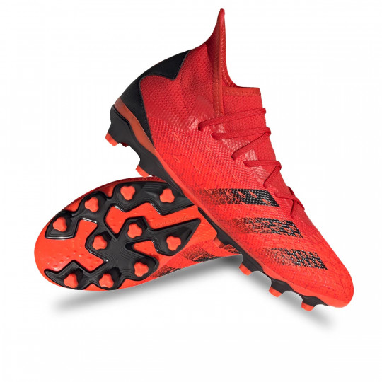 orange predator football boots