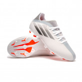 Zapatos de fútbol X Speedflow .3 FG Niño White-Black-Solar Red