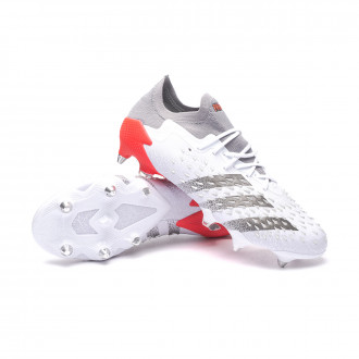 grey and orange football boots
