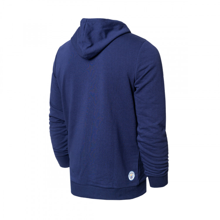 sudadera-puma-manchester-city-fc-fanswear-2021-2022-peacoat-team-light-blue-1.jpg