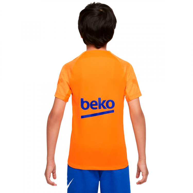 camiseta-nike-fc-barcelona-training-2021-2022-nino-vivid-orange-university-red-1.jpg
