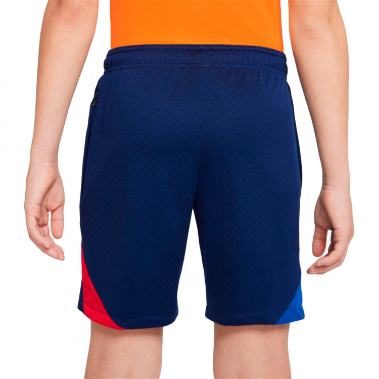 pantalon-corto-nike-fc-barcelona-training-2021-2022-nino-blue-void-university-red-vivid-orange-1.jpg