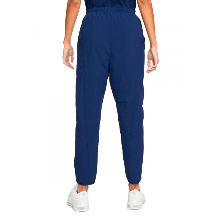 pantalon-largo-nike-fc-barcelona-fanswear-2021-2022-mujer-blue-void-vivid-orange-vivid-orange-1.jpg