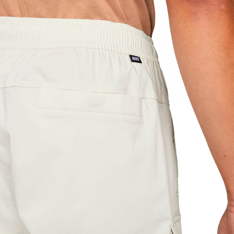 pantalon-corto-nike-nsw-sport-essentials-woven-ul-utility-light-bone-3.jpg
