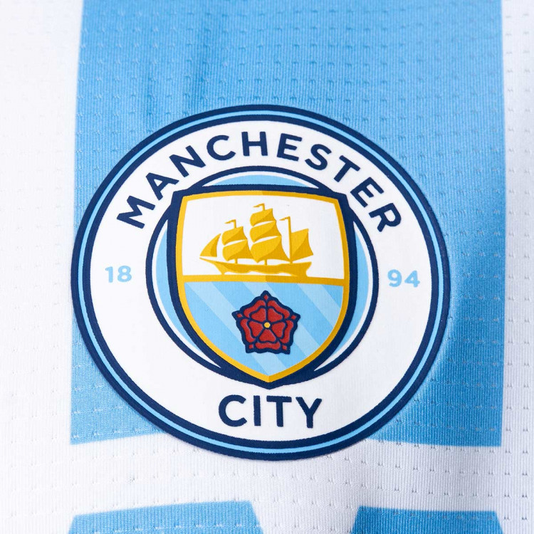 camiseta-puma-manchester-city-fc-pre-match-2022-2023-blanco-3.jpg
