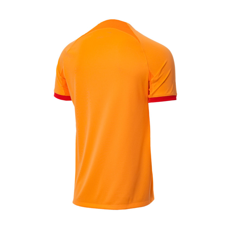 camiseta-nike-atletico-de-madrid-tercera-equipacion-stadium-2022-2023-peach-cream-atomic-orange-laser-crimson-1.jpg