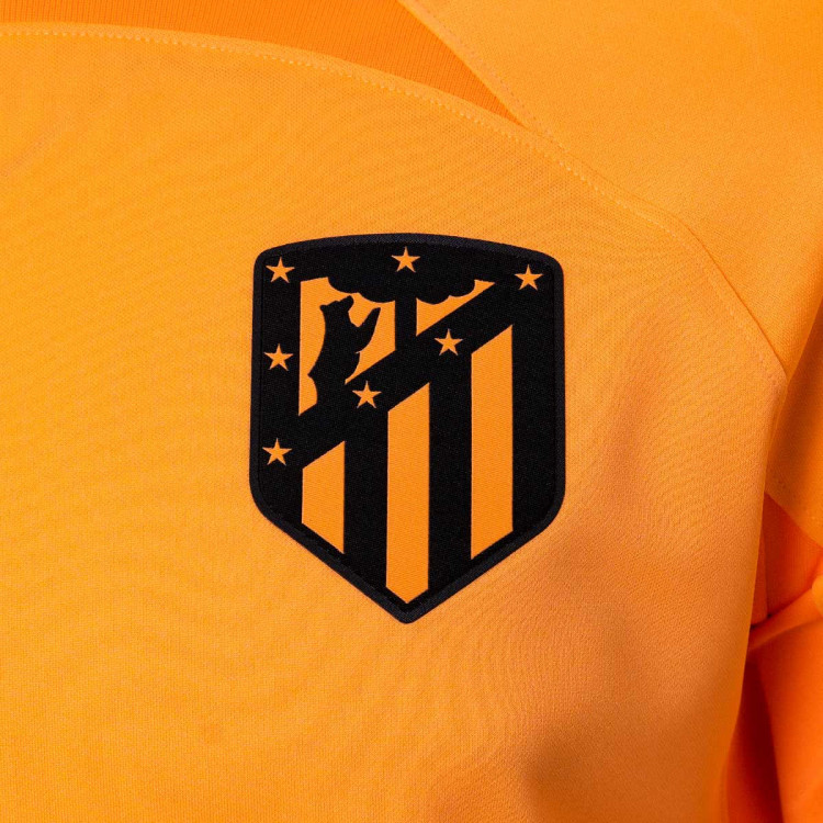 camiseta-nike-atletico-de-madrid-tercera-equipacion-stadium-2022-2023-peach-cream-atomic-orange-laser-crimson-2.jpg