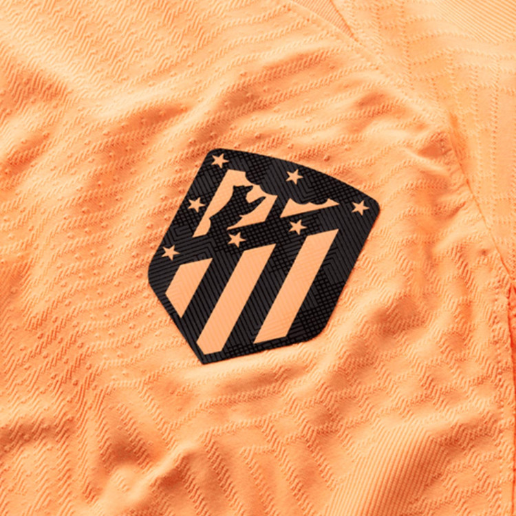 camiseta-nike-atletico-de-madrid-tercera-equipacion-match-2022-2023-peach-cream-atomic-orange-laser-crimson-2.jpg