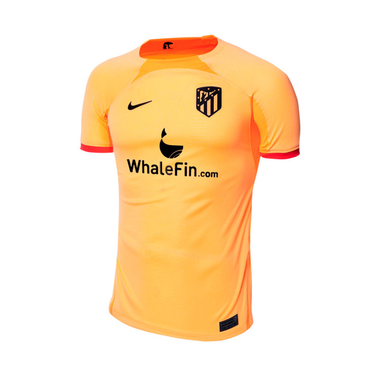 camiseta-nike-atletico-de-madrid-tercera-equipacion-stadium-2022-2023-nino-peach-cream-atomic-orange-laser-crimson-0