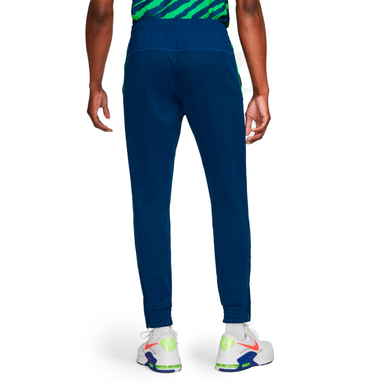 pantalon-largo-nike-brasil-fanswear-mundial-qatar-2022-coastal-blue-green-spark-1.jpg