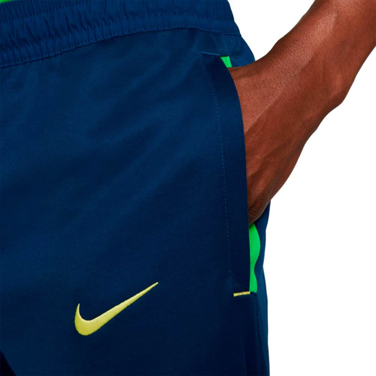 pantalon-largo-nike-brasil-fanswear-mundial-qatar-2022-coastal-blue-green-spark-2.jpg