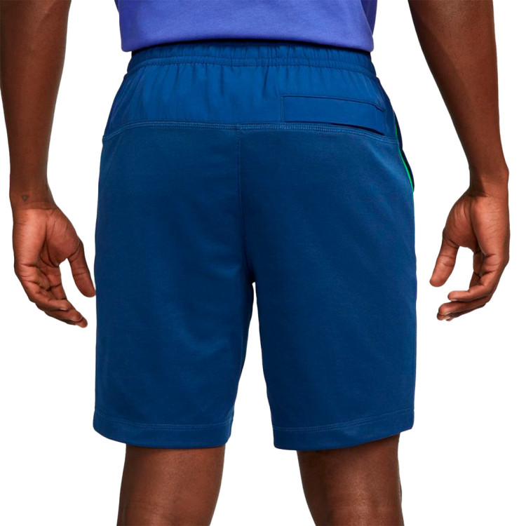 pantalon-corto-nike-brasil-fanswear-mundial-qatar-2022-coastal-blue-green-spark-1.jpg