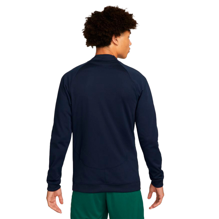 chaqueta-nike-portugal-pre-match-mundial-qatar-2022-obsidian-gorge-green-pepper-red-1.jpg