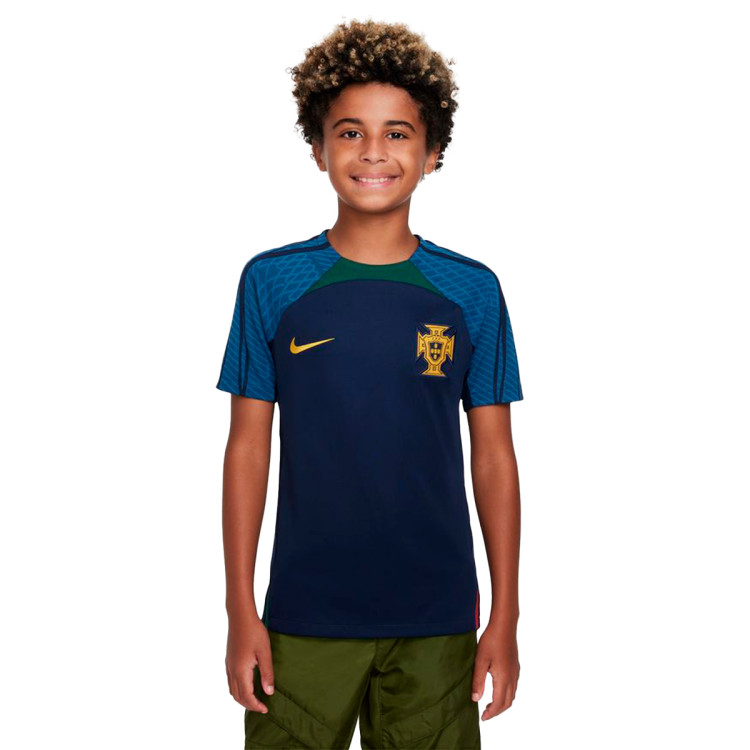 camiseta-nike-portugal-training-mundial-qatar-2022-nino-obsidian-gorge-green-pepper-red-0.jpg