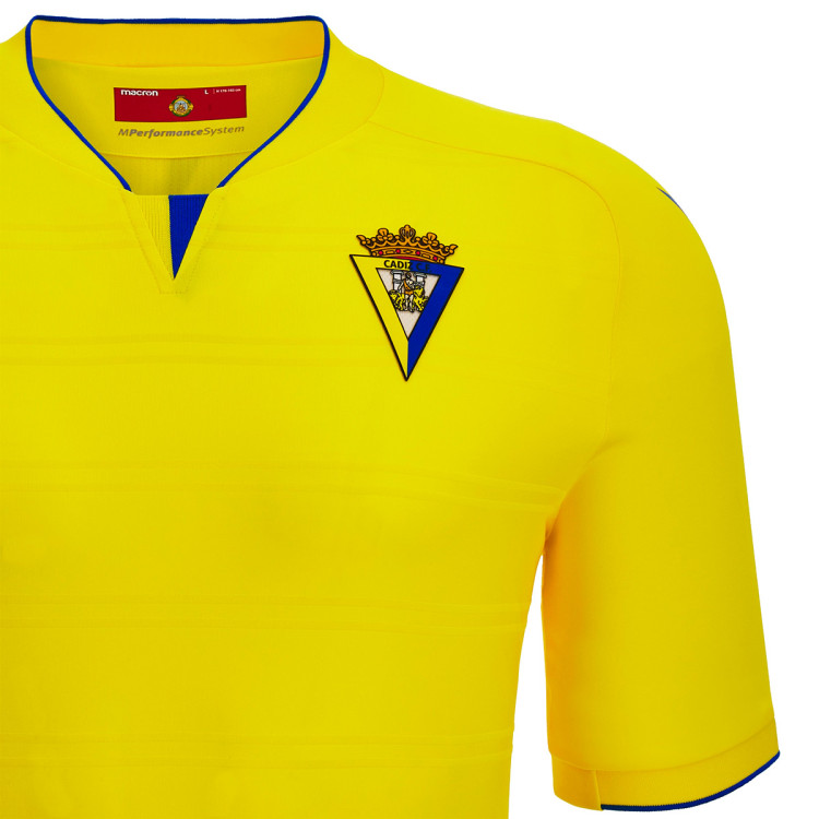 camiseta-macron-cadiz-cf-primera-equipacion-2022-2023-nino-yellow-2.jpg