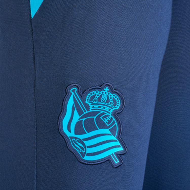 pantalon-largo-macron-real-sociedad-de-futbol-training-2022-2023-1.jpg