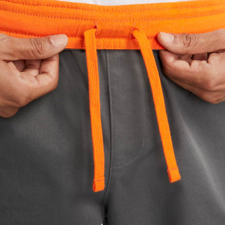 pantalon-largo-nike-sportswear-woven-iron-grey-safety-orange-4.jpg