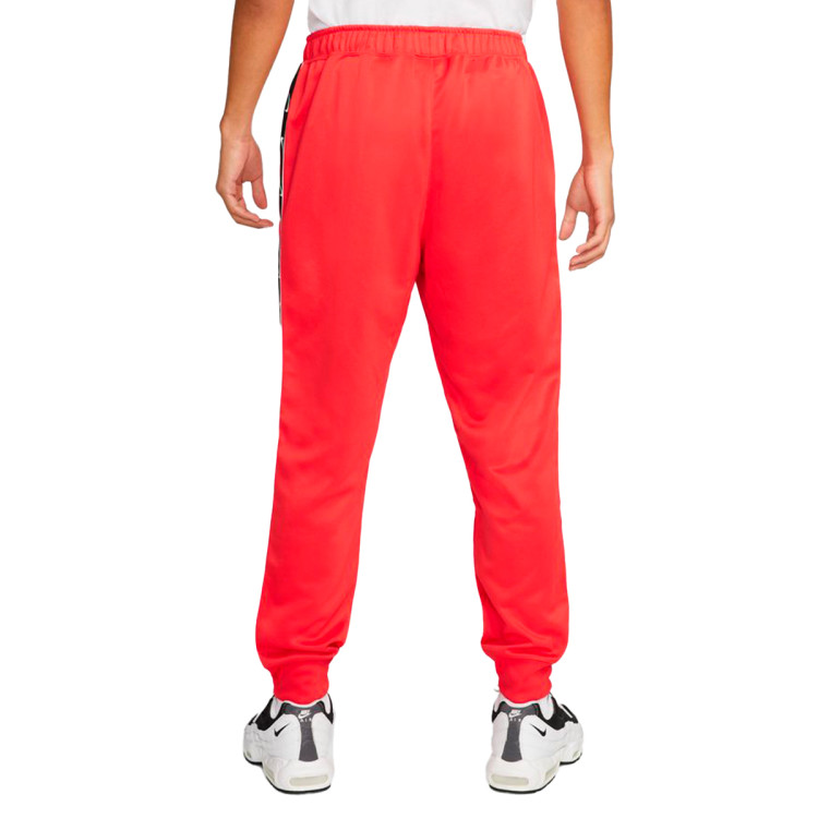 pantalon-largo-nike-sportswear-repeat-swoosh-polyknit-lt-crimson-black-1.jpg